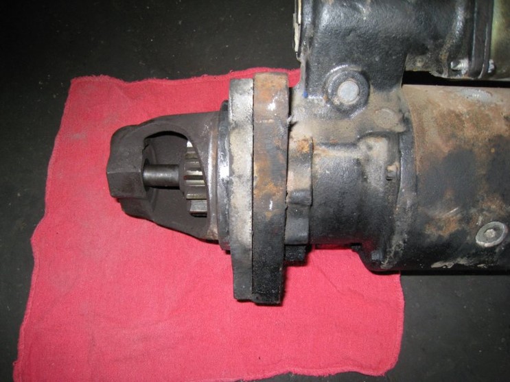 Example of a spacer between the bellhousing and starter motor
