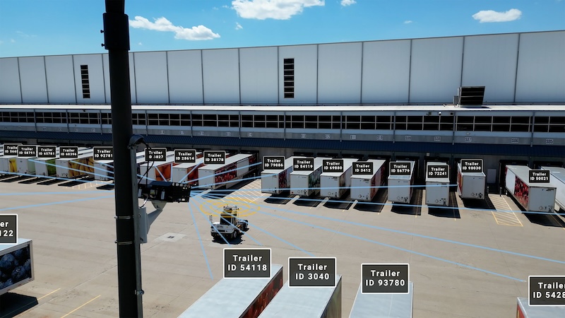 A demonstration of the HubPilot system displaying the statistics of various trucks in a parking lot.